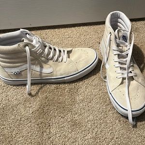 beige high top vans